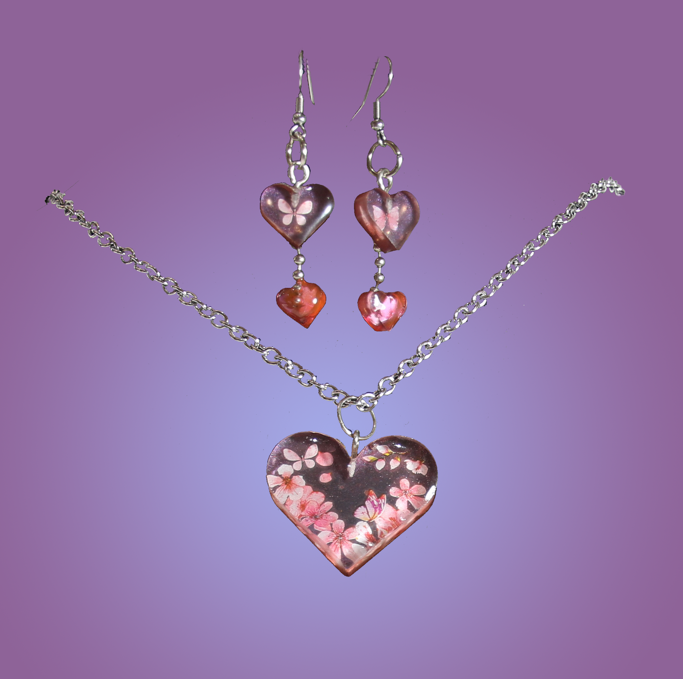Clear Heart Shaped Pendant with Cherry Blossom Detail and Matching Earrings